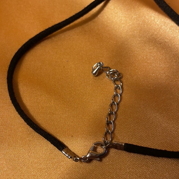 Gold and silver colored pendant on leather like cord strap - Picture 8 of 12